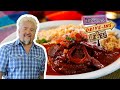 Guy fieri tries chamorro  diners driveins and dives  food network