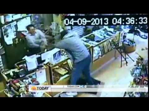 Store Owner Takes On Robbers With Baseball Bat Youtube