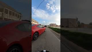 Impatient Driver Swerves at Motorcycle Rider