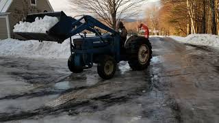 moving snow with ford tractor