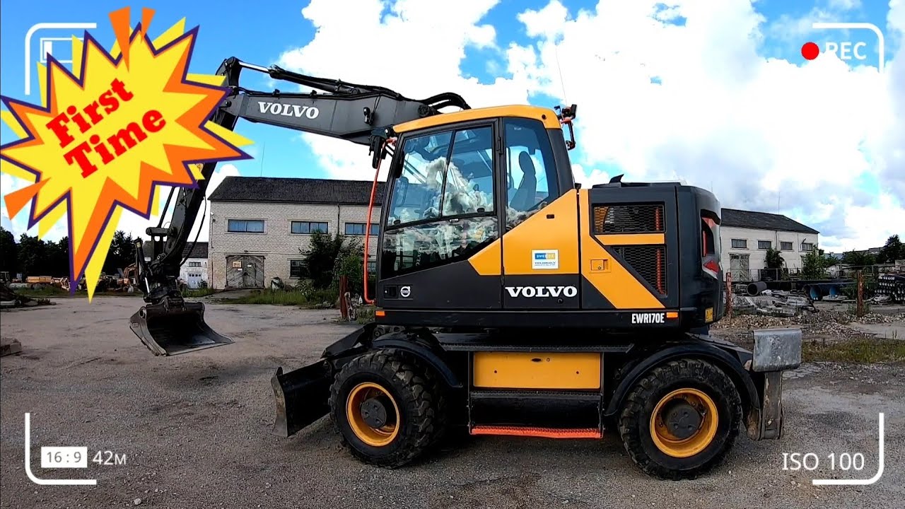 Колесный экскаватор с тилтротатором