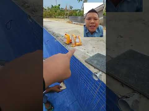 Video: Bagaimana anda membuat grout jubin kerikil?