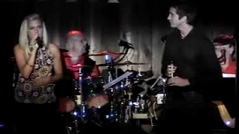 Paul Jolley and Rachel Witt singing "I Run to You"...