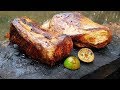 Primitive Times: Cooking Meat On a Rock
