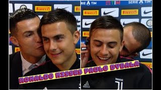 Ronaldo kissing Paulo Dybala