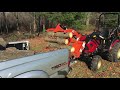 A custom tractor & grapple solution for clearing brush