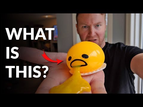 squishy puking egg yolk stress ball with yellow goop