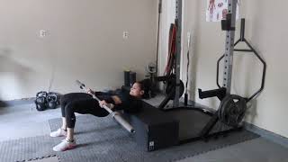 Barbell triple pulse hip thrusts