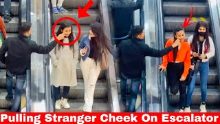 Pulling Strangers Cheeks on Escalator Prank || Harshit PrankTv