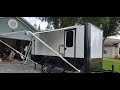 DIY Cargo Trailer Camper Conversion - Episode 4 - Aleko RV Awning Installation - Toy Hauler