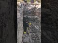 College student climbs down bare-handed to save man stuck on 30-meter cliff