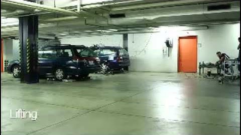 Autonomous Multi-Robot System for Vehicle Extraction and Transportation