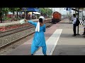 A lady gives cautionlist to the Loco pilot and Guard of a running train || Indian Railways