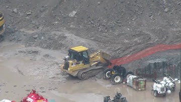CAT 963C track loader working in a foundation