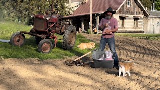 1920 planet JR #4 Planting green and potato’s the oldfashioned way, with the Farmall cub and a hoe