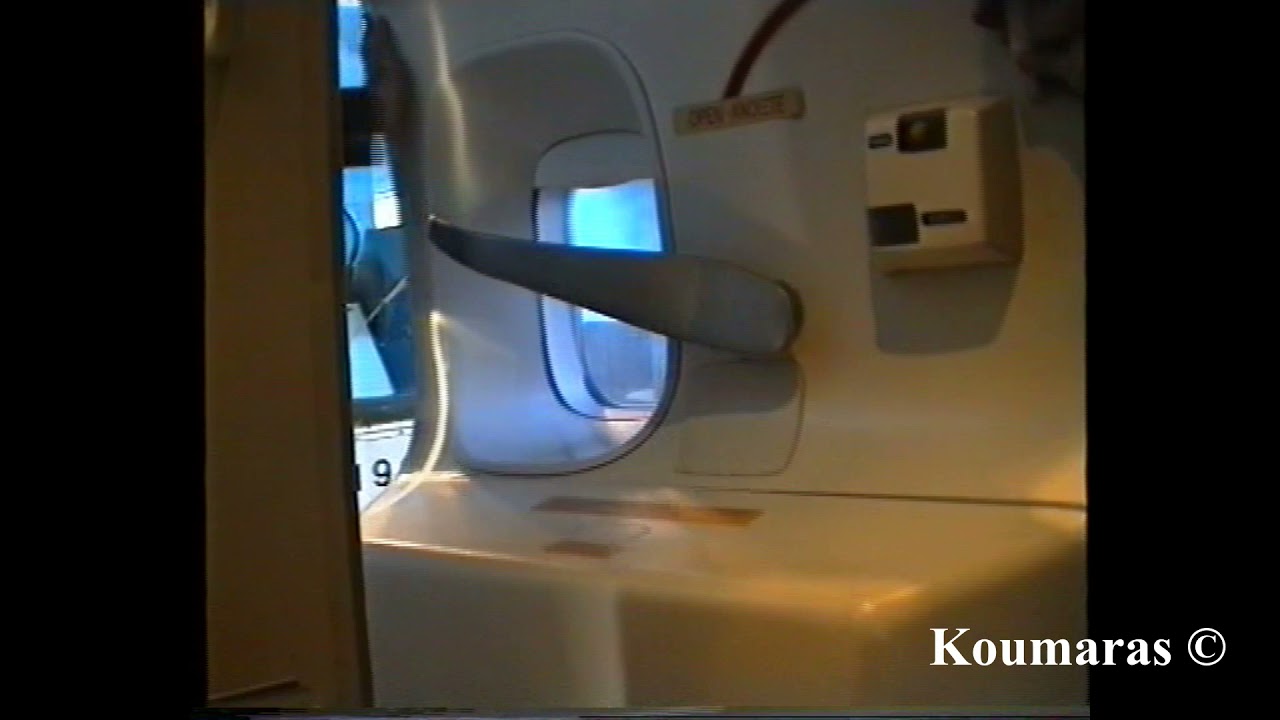 Olympic Airways 747 at Montreal Mirabel (YMX) Dec 1994 Door Opening - Disembarkation - Door Closing