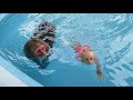 Kobi helps baby monkey mon overcome fear when learning swimming pool