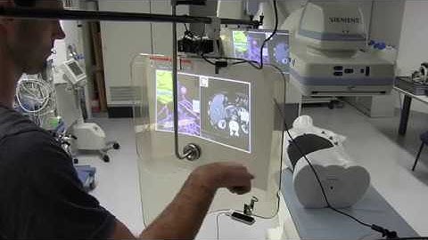 A gesture-controlled projection display for CT-guided interventions