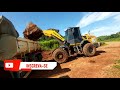 Ajeitando atoleiro  patrol Caterpillar 140k/pá carregadeira new Holland w130b