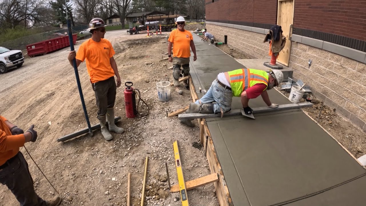 How to Pour 100 Foot of Monolithic Curb & Sidewalk - YouTube