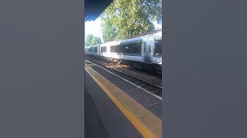 two Chiltern railway class 168 trains speed through Kings Sutton working moor Street to Marylebone