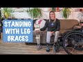 Standing with leg braces - It's nice to get out of the wheelchair