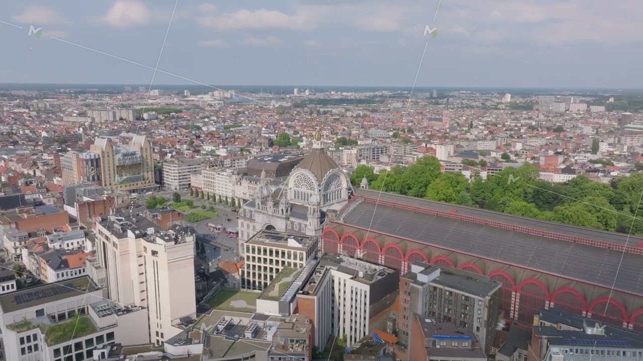 Aerial view of Antwerp Central Station with a camera panning slowly to the right, revealing the