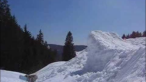 snowboarding double backflip attempt
