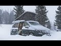 Car camping caught in a snow blizzard  austrian alps 1800m above sea winter van life asmr 