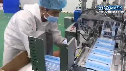 Mask ear loop welding machine with mask loading track and paging feeding system