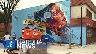A look at the new Indigenous mural in downtown Winnipeg | APTN News