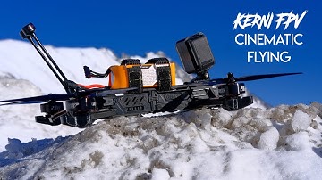 Majestic FPV Drone Journey Through Snow-Covered Peaks