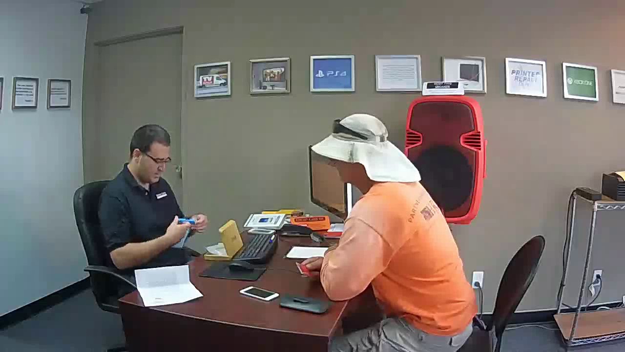 Mark returns repaired phone to customer