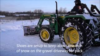 John Deere 5055e Snowplowing with our  Boss Plow