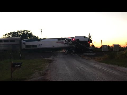 Passenger train hits multiple cars and semi!