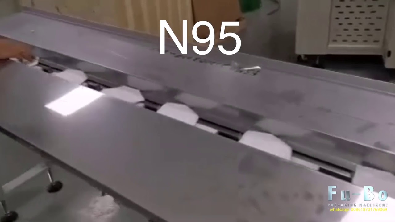 N95 mask and surgical mask packaging machine