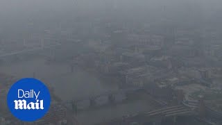 The 'view' from the Shard in London during the solar eclipse - Daily Mail