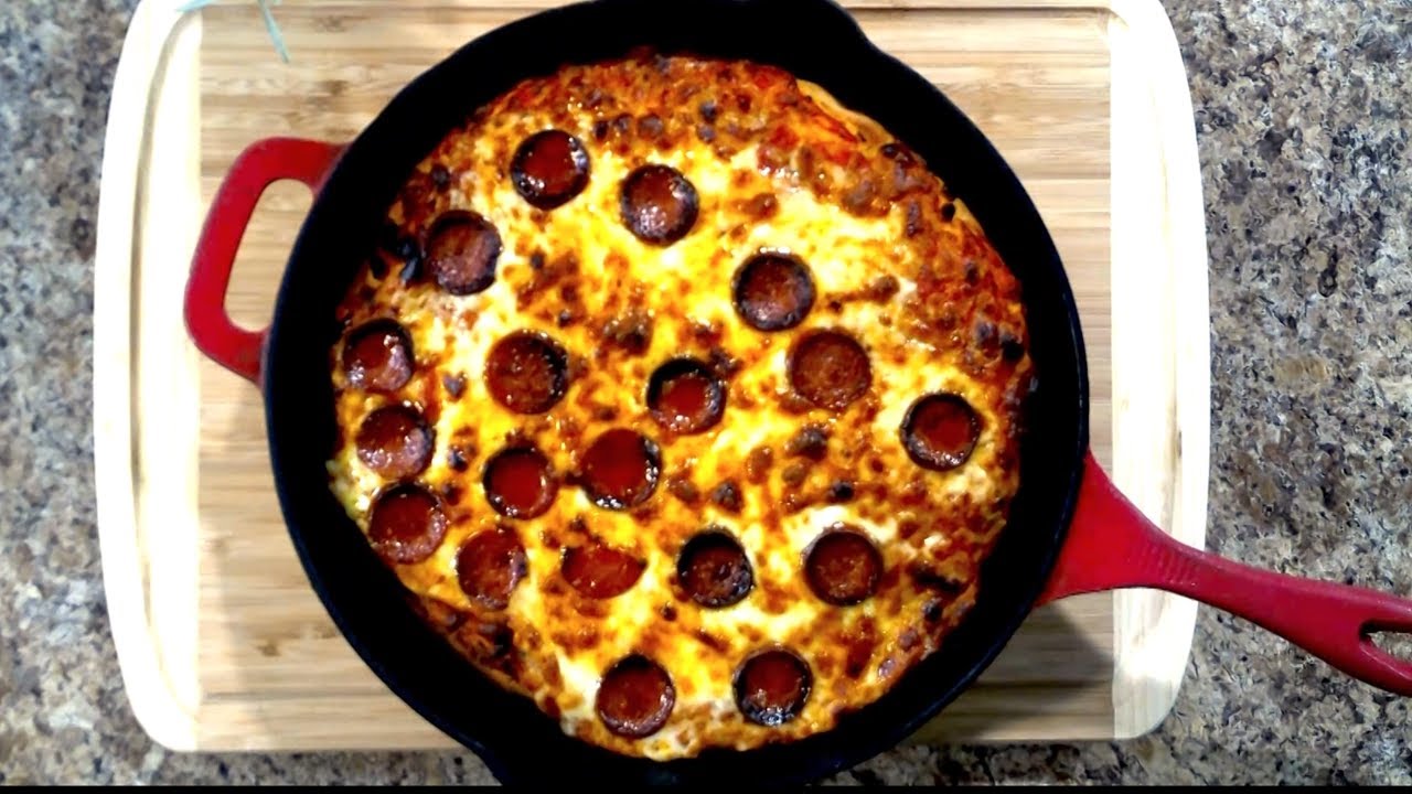 How to Make the Crispiest, Cheesiest Cast-Iron Pan Pizza 