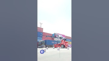 Kalmar Reach stacker with a tilting spreader for container handling