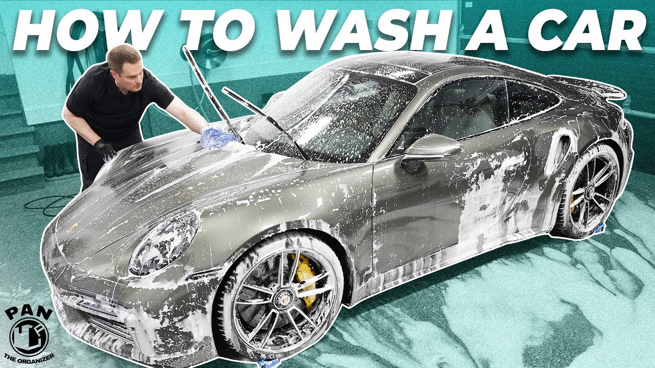 Cleaning car using active foam. Man washing his car on self car