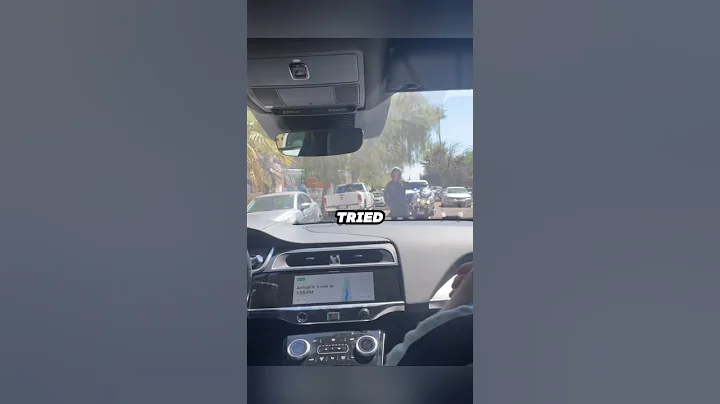 Waymo Self-Driving Car Gets Confused by a Cop During Parade 😂 - AI Taxi Meets Real-Life Cop