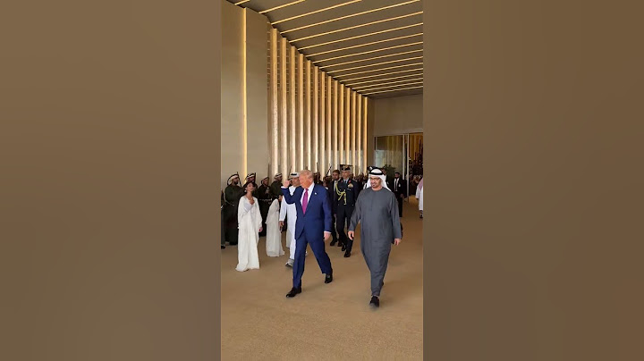 ‘I love it’: Trump greeted by swinging hair dancers in Abu Dhabi
