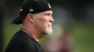 Commanders head coach Dan Quinn speaks at training camp