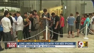 Thousands across the country wait in line for new iPhone models
