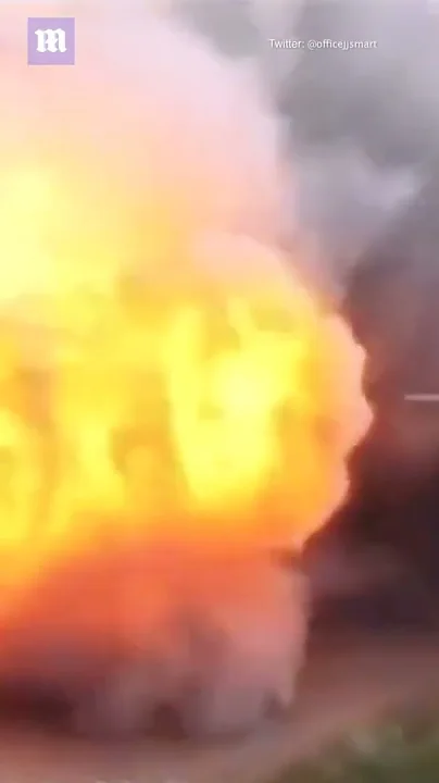 Russian tank falls apart after hitting Ukrainian mines and is completely engulfed in flames