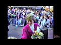 Princess Diana in a pink coat meeting bystanders in Swadlincote, Derbyshire, England, UK (1991)