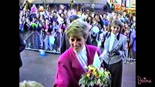 Princess Diana in a pink coat meeting bystanders in Swadlincote, Derbyshire, England, UK (1991)