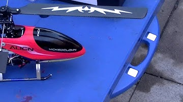 =wc= no fear custom titan clone trex 450 keep it cheap 5 dolla mg servos