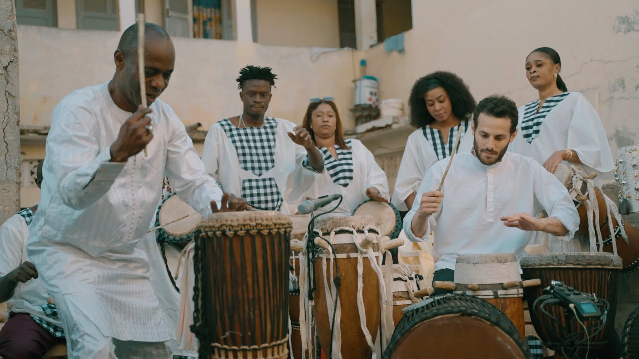 Watch ROSE RHYTHM • Ben Aylon & Les Rosettes (Doudou Ndiaye Rose) on YouTube Watch ROSE RHYTHM • Ben Aylon & Les Rosettes (Doudou Ndiaye Rose) on YouTube
