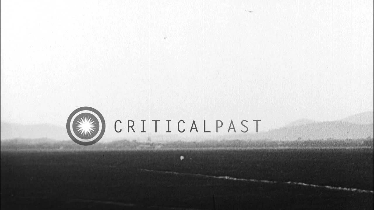 Italian bombers drop bombs over Austrian positions in Italy  during World War I. HD Stock Footage